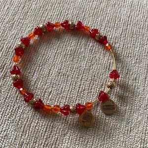 Alex and Ani bangle with red and orange beads